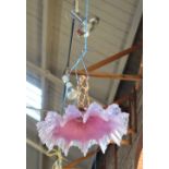 AN EARLY 20TH CENTURY PINK "VASELINE" TYPE FRILLED HANGING LIGHT SHADE