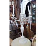 A WHITE METAL PAINTED FIVE SECTION CANDELABRA with glass lustre drops
