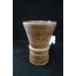 AN ANDEAN KERO CARVED HARDWOOD CUP of flared tapering form, incised decoration,