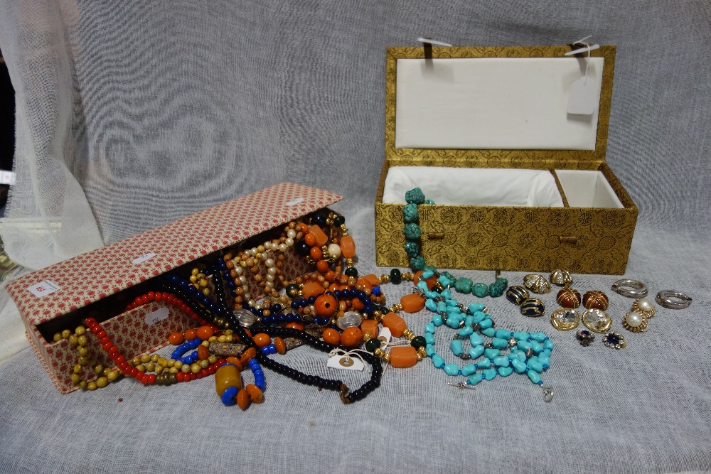 A COLLECTION OF BEADED JEWELLERY AND EAR CLIPS