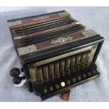 AN EARLY 20TH CENTURY ACCORDION