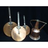 THREE VICTORIAN GRADUATED COPPER AND IRON SAUCEPAN LIDS stamped 'G.O. 4, 8, 9' and an Eastern copper