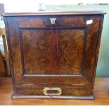 A VICTORIAN BURR WALNUT STATIONERY CABINET with fall down front flap and drawer, 42cm wide