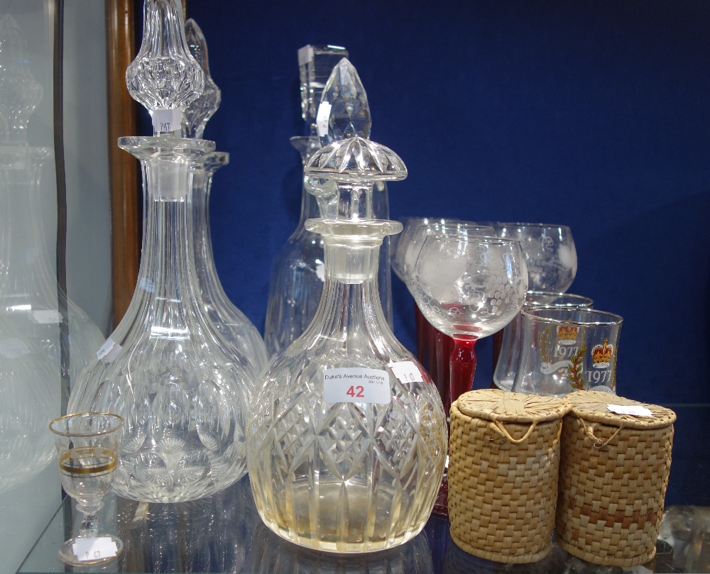 A PAIR OF VICTORIAN CUT GLASS DECANTERS and other similar glassware