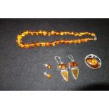 A COLLECTION OF 'AMBER' JEWELLERY, to include a necklace, brooch and earrings