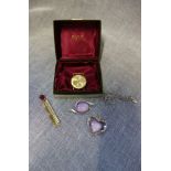 A VINTAGE GENTLEMAN'S AVIA WRISTWATCH (no strap) a costume pendant of heart form and a similar