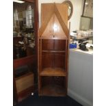 A VINTAGE TEAK ROWING SCULL by Sims & Sons of Putney, adapted into a bookcase, c. 1930, 192cm high x