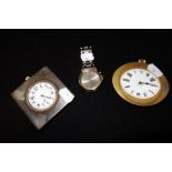 A GENTLEMAN'S SEIKO QUARTZ WRISTWATCH and two travelling bedside clocks (3)