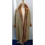 A VINTAGE FUR LINED MACKINTOSH and a fur stole by Harrods