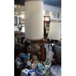 AN OVERSIZED ITALIAN PAINTED AND GILTWOOD PEPPER GRINDER, a 1960s pottery lamp and a collection of