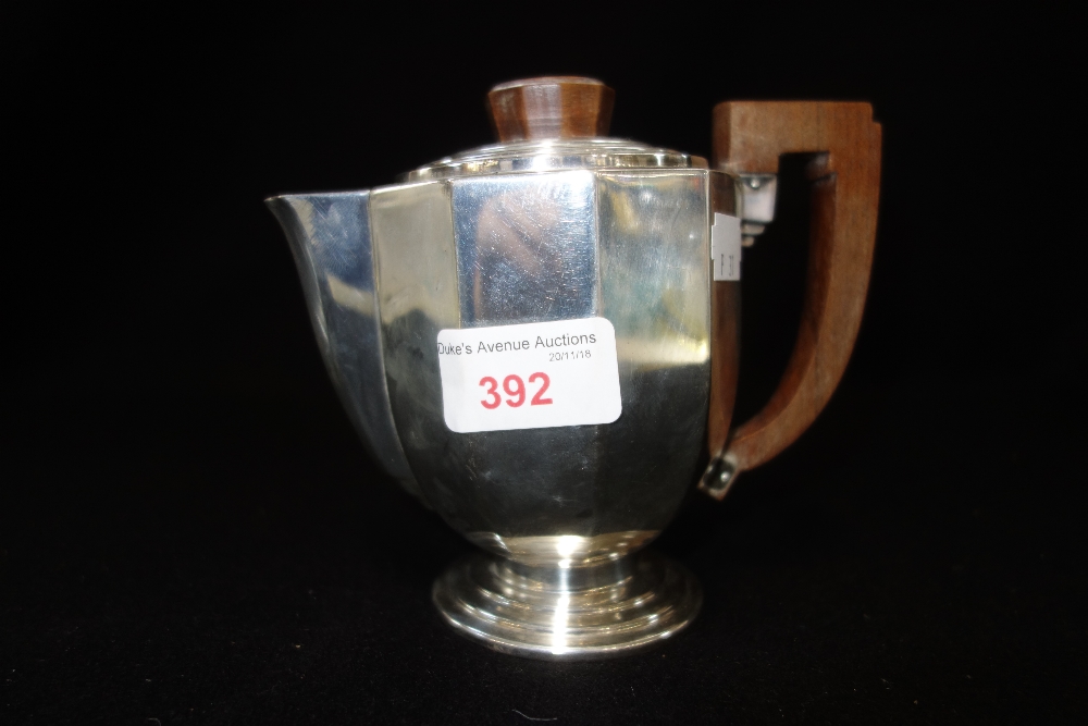 A CONTINENTAL ART DECO SILVER HOT WATER JUG, stamped 800 (c.7.5oz)