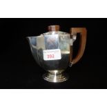 A CONTINENTAL ART DECO SILVER HOT WATER JUG, stamped 800 (c.7.5oz)