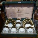 A SET OF SIX MINTON 'GRANDEE' BONE CHINA COFFEE CANS AND SAUCERS in original presentation case