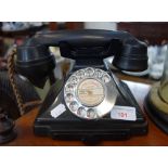 A VINTAGE BAKELITE PYRAMID TELEPHONE 200 series, in black with pull-out tray