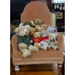 A VINTAGE UPHOLSTERED CHILD'S CHAIR and a collection of bears and soft toys