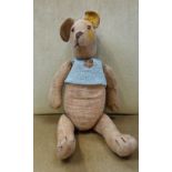 A VINTAGE EARLY 20TH CENTURY JOINTED TEDDY BEAR, (a well loved bear) wearing a knitted vest