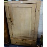 A 19TH CENTURY STRIPPED PINE KITCHEN CUPBOARD with single door over a drawer, 76cm wide