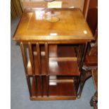 A REPRODUCTION MAHOGANY REVOLVING BOOKCASE, a George III dining chair and other small furniture (