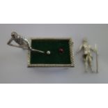 A CONTEMPORARY NOVELTY SILVER MODEL, in the form of two figures playing billiards, 6.5cm long (c.