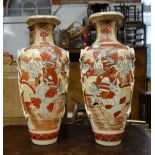 A PAIR OF LARGE JAPANESE VASES decorated with warriors, 49.5cm high