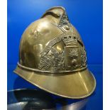 A 19TH CENTURY FRENCH BRASS FIREMAN'S HELMET from "Du Airronville" Fire Brigade , circa 1850