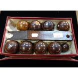 AN EDWARDIAN SET OF WOODEN TABLE BOWLS in original box