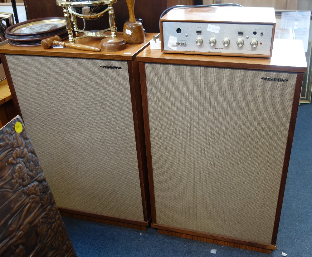 A LARGE PAIR OF VINTAGE "TANNOY" SPEAKERS, in teak cases, each 84cm high x 55cm wide and a Rogers "