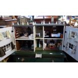 G.J. LINES; A RESTORED VINTAGE DOLLS HOUSE, No DH/10 circa 1920's, with a fully furnished