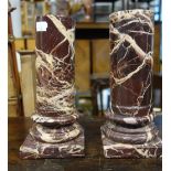 A PAIR OF 19TH CENTURY TURNED ROUGE VEINED MARBLE COLUMNS, 22.5cm high