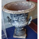 A LARGE CAST IRON GARDEN URN of Classical form, 76cm high