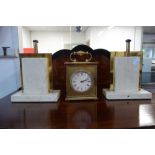 A PAIR OF ART DECO STYLE TABLE LAMP BASES (filled tops) and a brass mantel clock