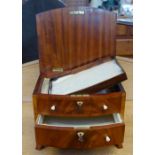 A MAHOGANY JEWELLERY CHEST in the form of a miniature bowfronted chest of drawers, 28cm wide