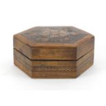 Tunbridge Ware hexagonal box with micro mosaic inlay, the hinged lid decorated with a flower head,