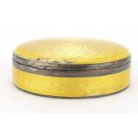 Circular silver and yellow guilloche enamel box with hinged lid, C & C 925 import mark, 6cm in