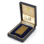 Dunhill gold plated pocket lighter with fitted case, 6cm high :