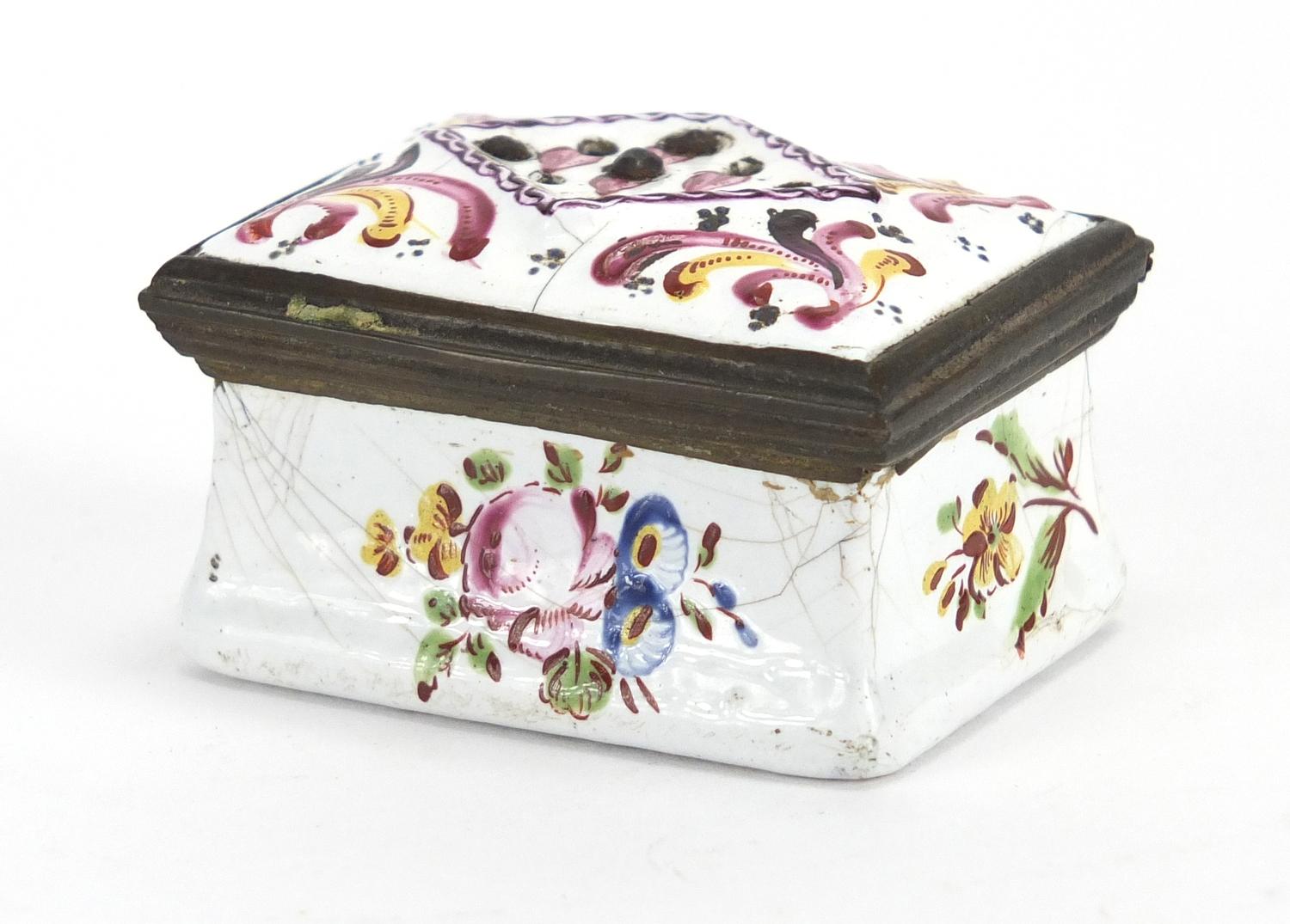 Antique rectangular enamel patch box hand painted with flowers, 3cm H x 4.6cm W x 3.5cm D Further