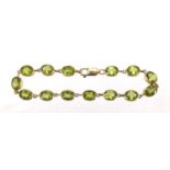 9ct gold Peridot bracelet, 18cm in length, approximate weight 13.5g The tables of the Peridot are