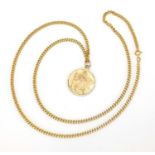 18ct gold curb link necklace, with a 9ct gold St Christopher pendant, the necklace 68cm in length,