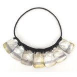 Indian Goa style Mother of Pearl shell necklace, each having a geometric design, 34cm wide Further