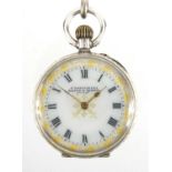 Ladies T. Fattorini silver open face pocket watch with ornate dial and floral engraved case, with