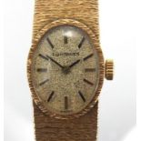 Ladies 9ct gold Longines wristwatch with 9ct gold strap, approximate weight 31.8g Further