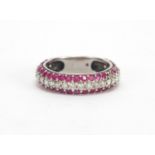 Unmarked white metal Diamond and Ruby half eternity ring, size P, approximate weight 4.5g The Ruby's