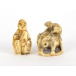 Two Japanese carved Netsuke's, one of a seated figure, the largest 3cm high Further condition