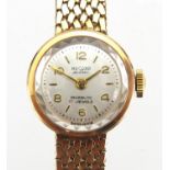Ladies 9ct gold Record wristwatch with 9ct gold strap, boxed, approximate weight 25.2g Further