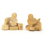 Pair of Japanese carved ivory Okimono's, both of seated workers, each 5cm high Further condition