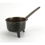 Large bronze tripod skillet, 46cm in length Further condition reports can be found at the