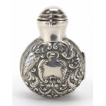 Miniature silver cased green glass scent bottle by William Comyns, the case embossed with birds