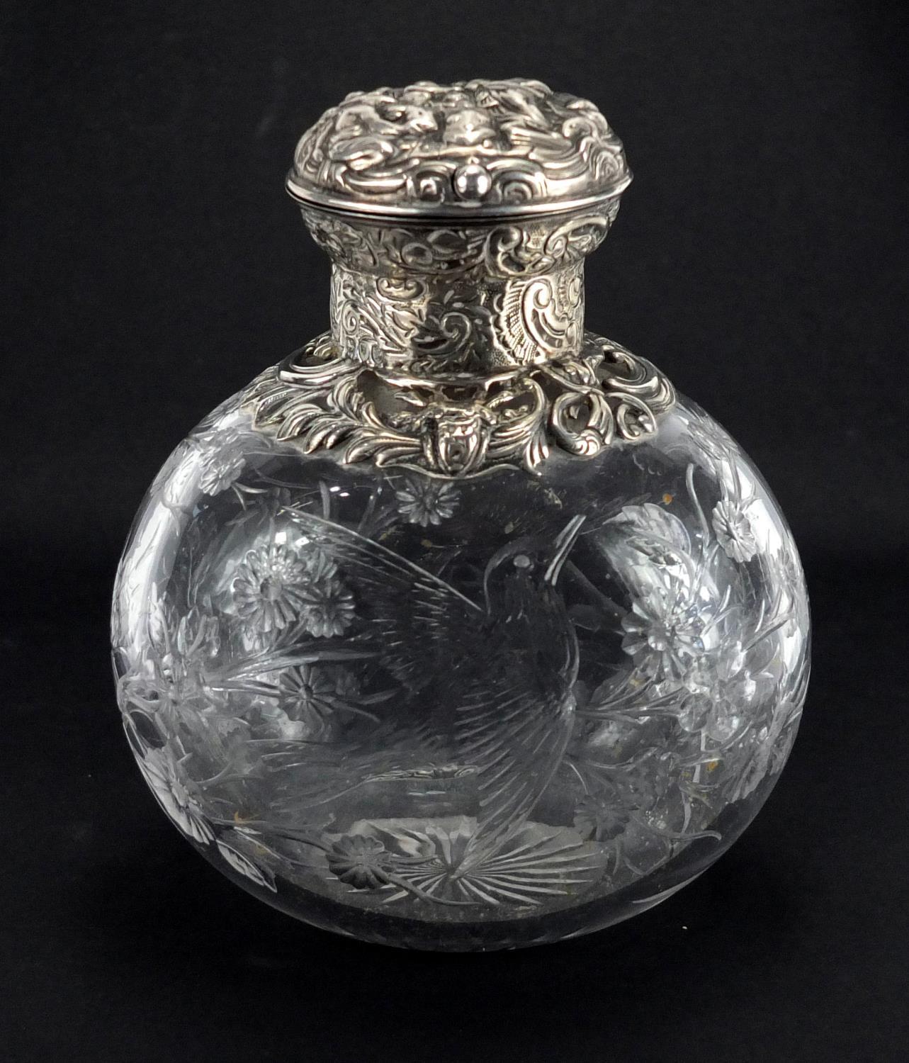 Victorian silver topped Webb rock crystal scent bottle carved with a bird amongst flowers, the