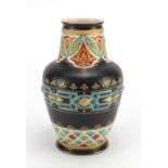 Mettlach pottery vase hand painted with stylised floral motifs, impressed factory marks and numbered