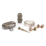 Miscellaneous objects including an 800 grade silver pill box, double sovereign case and figural